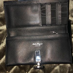 New black with silver logo wallet. Leather good